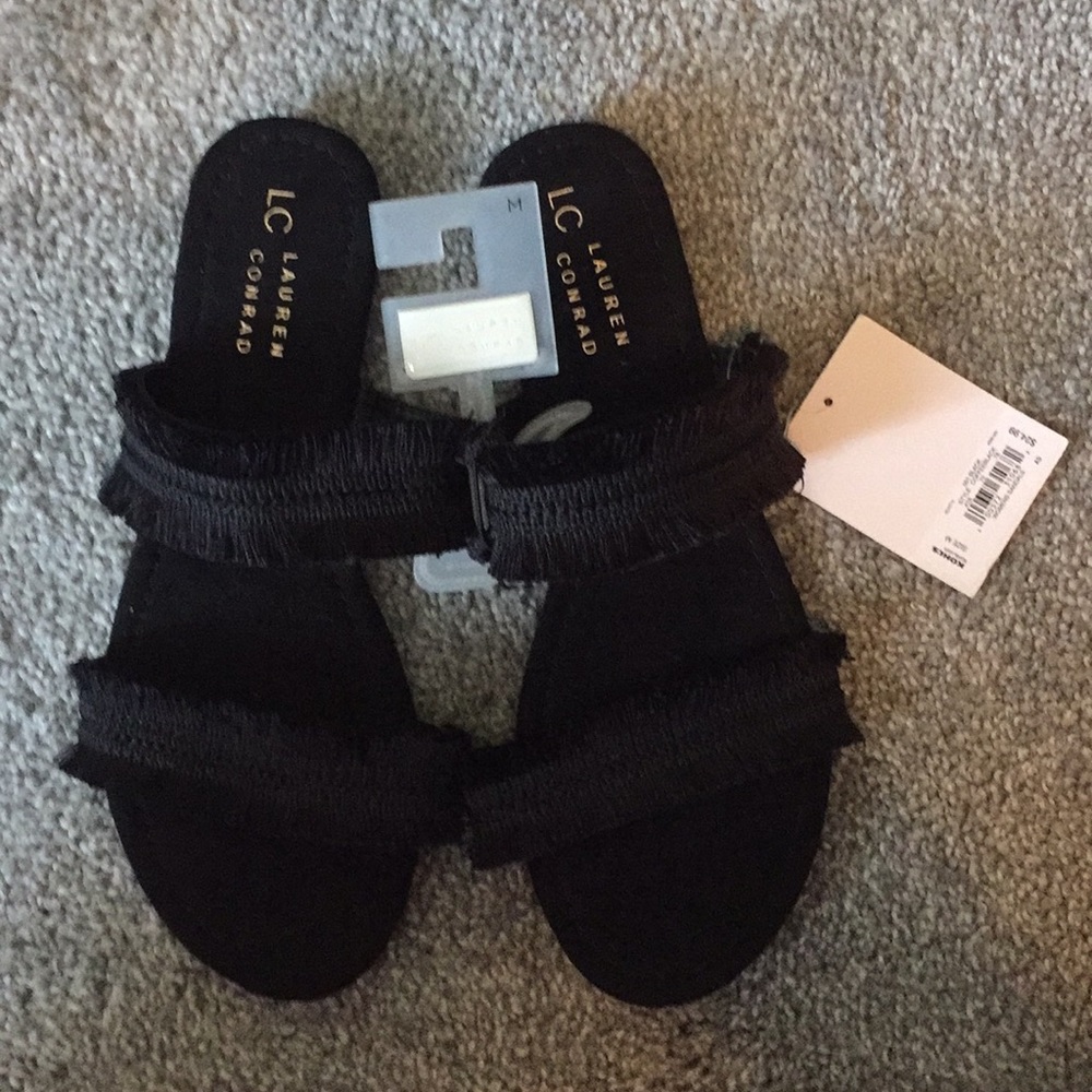 Black slip on sandals